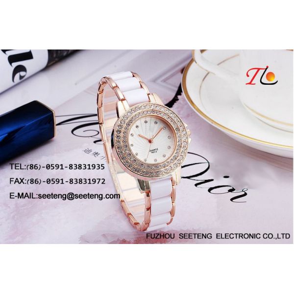 elegant  ladies watch wrist watch with lots of  diamonds ceramic and alloy strap
