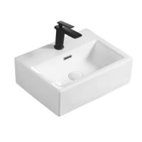 Cuve de lavage en porcelaine blanche sur le comptoir Cuve de bain en céramique rectangulaire