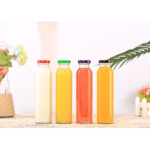 Пустые круглые стеклянные бутылки сока, портативная дождевая капля приправленная бутылка с водой