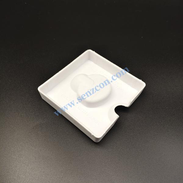 High-end jewelry pendant with a white pulp molding base, made by wet pressing of plant fibers, degradable, recyclable, and compliant with the plastic ban order.
