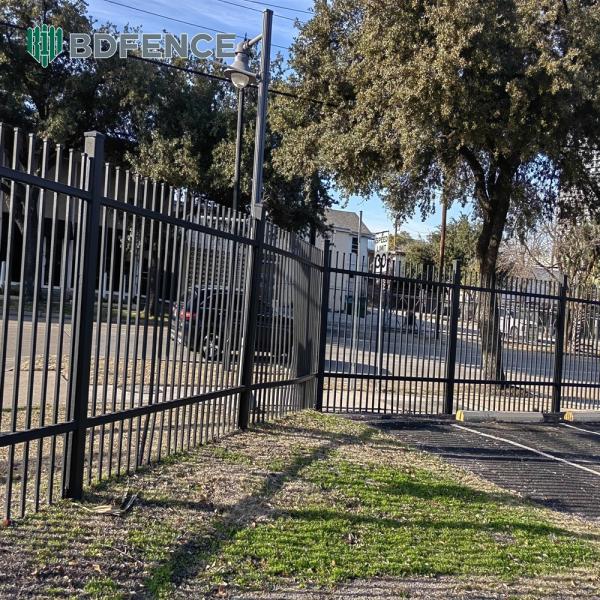 Sleek Tubular Steel Fence Enhances Curb Appeal