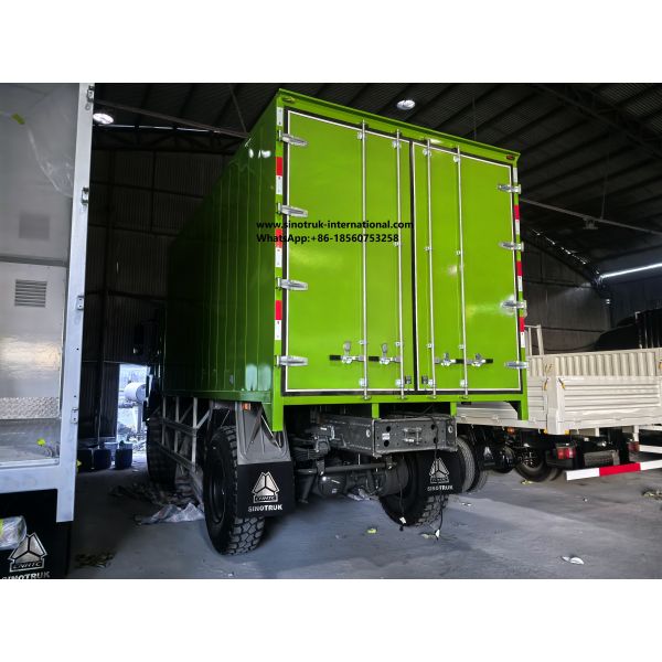 SINOTRUK Heavy Duty Truck with 4X4 LHD Drive Type, 5000*2300*2300 mm Cargo Tank, and 16T Rear Axle Capacity for Heavy Load Hauling