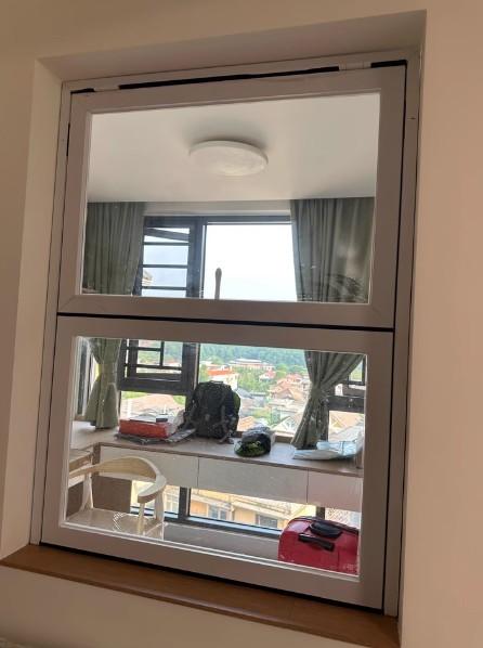 Emergency Egress Folding Window System Meeting Building Codes While Maintaining Aesthetic Cohesion