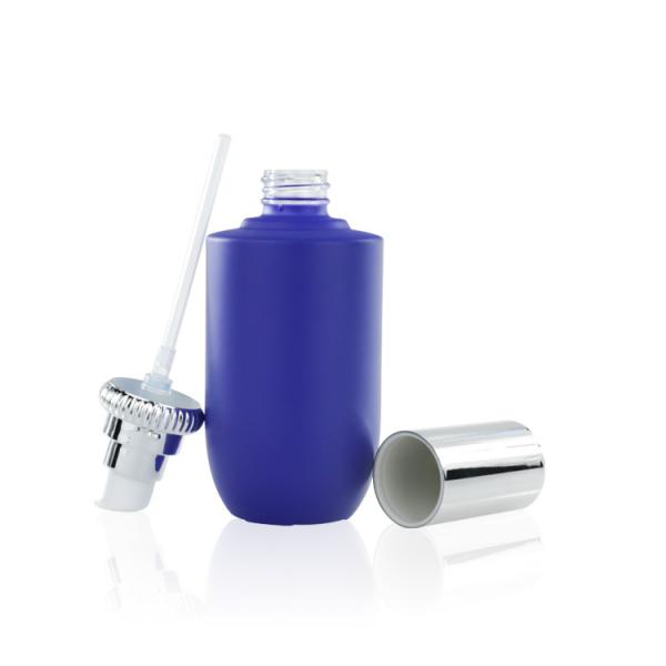 A bomba de vidro azul do soro do ODM 100ml engarrafa com bomba e tampa de prata