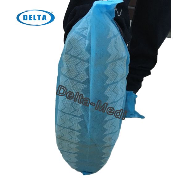 Nonwoven shoe cover. Disposable custom printed non-skid shoes cover.protect the shoes  from pollution water and dust