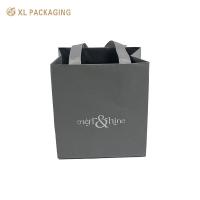 Sac de papier de vente directe d'usine gris Un pour l'emballage cadeau Petit sac cadeau avec logo Ajouter sac de magasinage