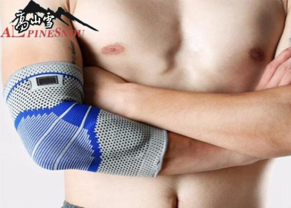 Tissu tricoté par protecteur antidérapant S M L taille de coude de sports de silicagel