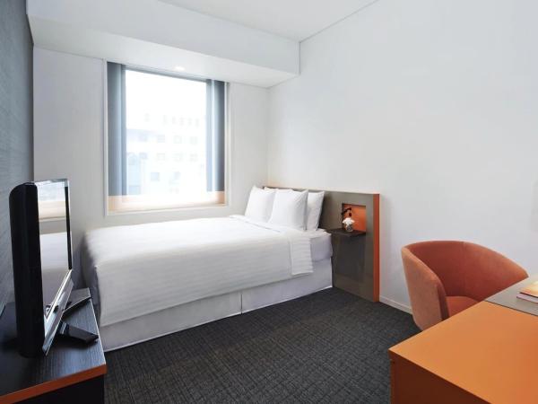 Darwin hotel style apartment samll space furniture by single bed with dining table and leather sofa chair