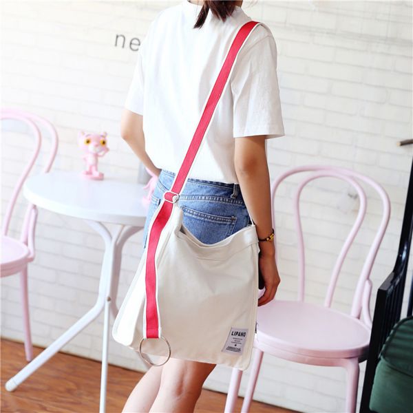 New canvas small ring shoulder Messenger bag simple portable leisure Joker bag women