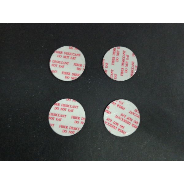 Biodegradable Fiber Desiccant , Round Shaped Moisture Absorbent Packs For Pharmaceuticals