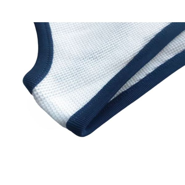 Mens tanktop featuring 100 percent cotton waffle fabric body solid color with contrast color rib piping around neck and armhole