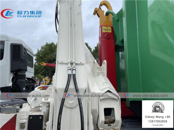 SINOTRUK HOWO 8x4 LHD Hydraulic Hooklift Garbage Truck With Folded Arm Crane