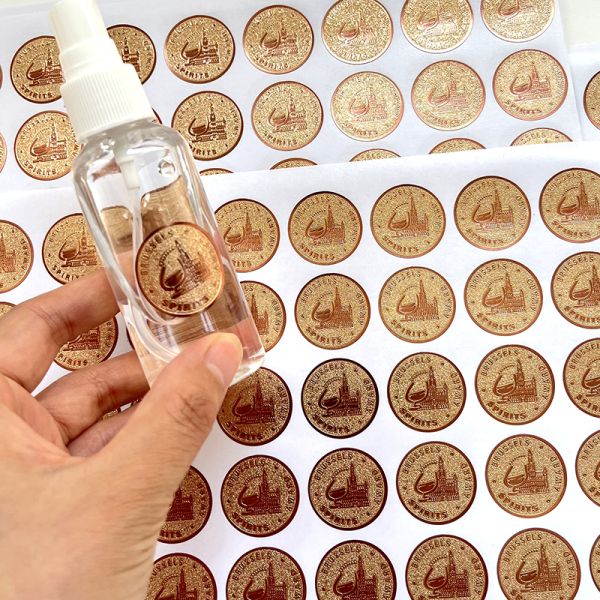 Hot Sale Custom Round Adhesive Label Vinyl Embossed Rose Gold Foil Texture Paper Perfume Bottle Circle Label Sticker Sheet