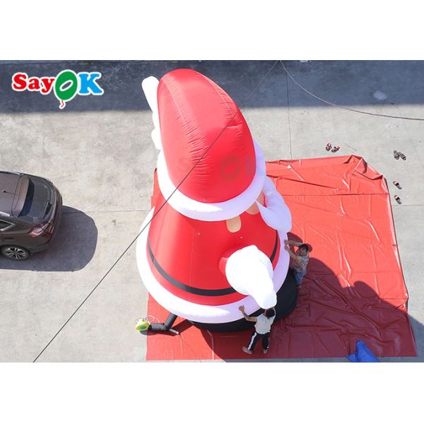 Большой раздувной Санта-Клаус взрывает украшение Xmas для активного отдыха