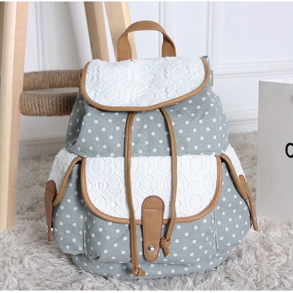 2016 new winter female European and American fashion jacquard material dot pattern lace embroidered backpack canvas bag