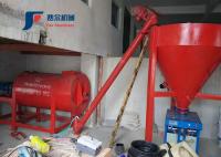 Le petits mortier d'affaires à la maison et mastic secs à grande vitesse de mur saupoudrent le malaxeur