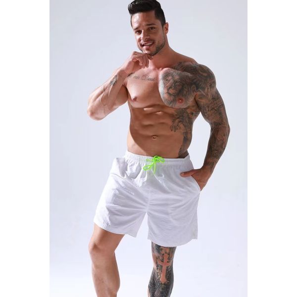 Swimwear людей сплошного цвета замыкает накоротко водоустойчивую носку пляжа шортов заплыва для людей