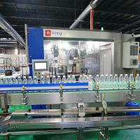 Le site du client de Yunnan Honghe, 54.000 bouteilles par heure Machine d'étiquetage OPP haute vitesse