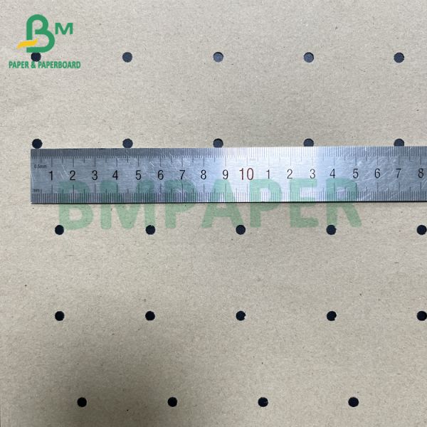 70gsm Recyclable Round Hole Perforating Underlay Kraft Paper For Garment Factory 70 гсм перерабатываемая круглая отверстие перфорирующая подкладка kraft бумаги для швейной фабрики