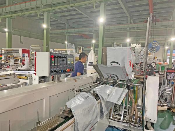 Shaftless Unwind DHL TNT UPS SF Courier Bag Making Machine Wicketter