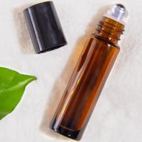 Bouteille à rouleaux en verre noir et clair à 10 ml pour les huiles essentielles de parfum