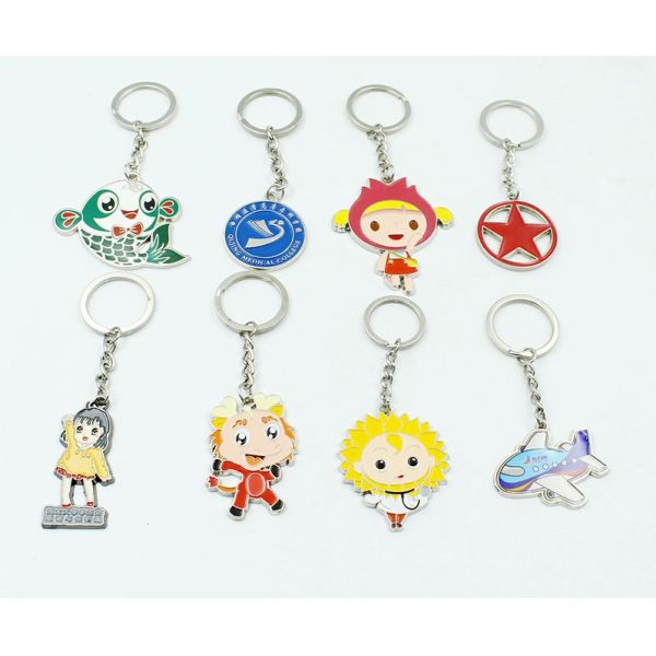 Zinc alloy paint enamel metal fish plane girls key chain cartoon character pendant creative small Yiwu gift