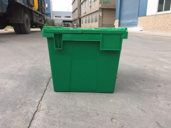 Yellow Plastic Storage Bins Attached Lids Stacked For Transportation