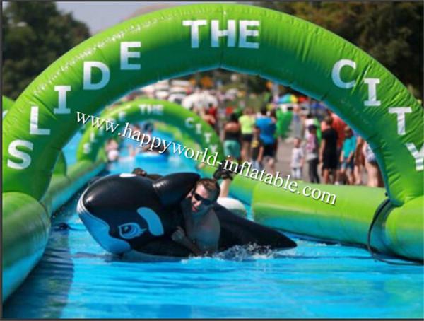 1000 ft slip n slide inflatable slide the city , slide the city , city slide , water slide