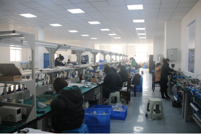 Dead Weight Tester Designed for High Accuracy Pressure Calibration Using Isooctyl Sebacate Working Fluid and Stable Core