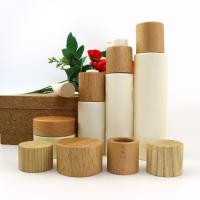 Bouteilles de cosmétiques rondes sur mesure Bouchons de bouteilles non-déversements Bouteille de crème Couvercle en bois