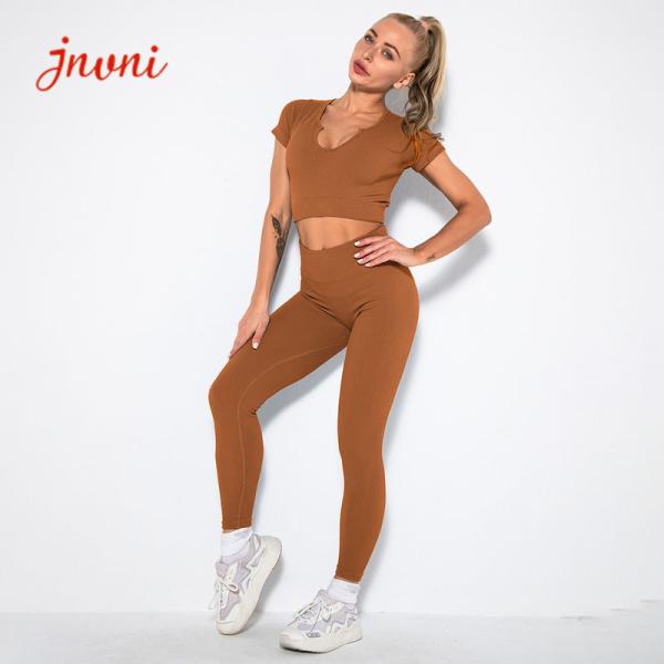O Activewear com nervuras sem emenda das mulheres do ISO ajusta grupos altos das caneleiras da cintura do comprimento completo