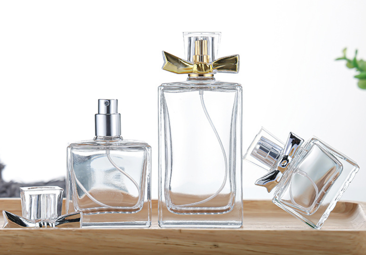 50 / 100ml Perfume vidrio transparente botella de aerosol personalizada Cosmético engrosado aspecto elegante y discreto