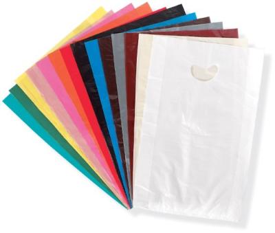 O presente cortado do retalho do plástico do punho ensaca o material do LDPE para comprar