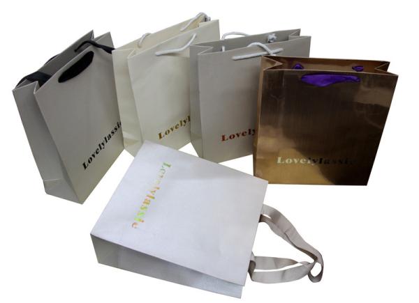 Eco-friendly 200g Golden Paper Carrier Bag With Glued Ribbon Handle, Logo Stamped