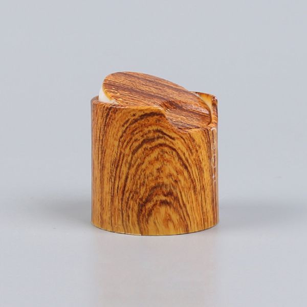 Пластмасса влияния крышек бутылки лосьона Tassel 28-410 деревянная разливает крышки по бутылкам диска верхние