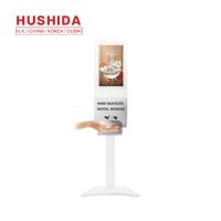 Assoalho que está o distribuidor automático do Sanitizer da mão da exposição 20W do LCD