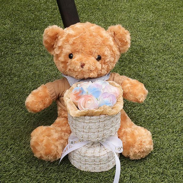 A teddy bear doll bouquet, a birthday gift for graduation on the Qixi Festival, a girl gives her best friend and girlfriend a teddy bear hug and a soap bouquet