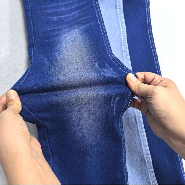 Tejido vaquero de satén azul cielo con hilos OE de alta elasticidad de 9 oz JSD8168SB para ropa versátil y ecológica - Chaleco