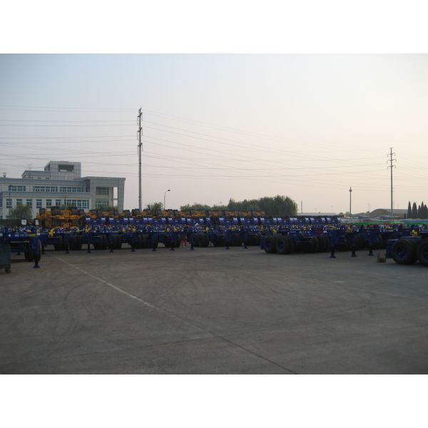 3 Axles 50 Tons ABS Braking System Low Flat Bed Semi Trailer For Machine Transport