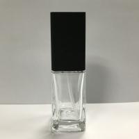 A garrafa de vidro feita sob encomenda Skincare que empacota, garrafa da loção 40ml da bomba, fundação engarrafa o tampão plástico