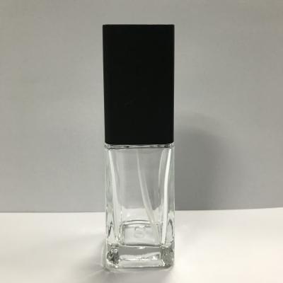A garrafa de vidro feita sob encomenda Skincare que empacota, garrafa da loção 40ml da bomba, fundação engarrafa o tampão plástico