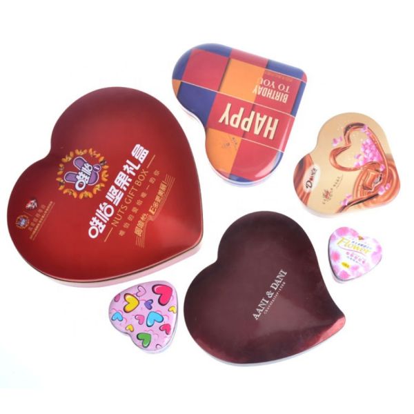 Сердце формирует коробку олова подарка упаковывая лоснистый печатая выбитый логотип