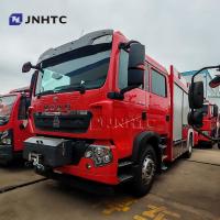 Truc de lutte contre les incendies Howo TX 5000L Cisterne à mousse d'eau 4X4 Avec camion grue