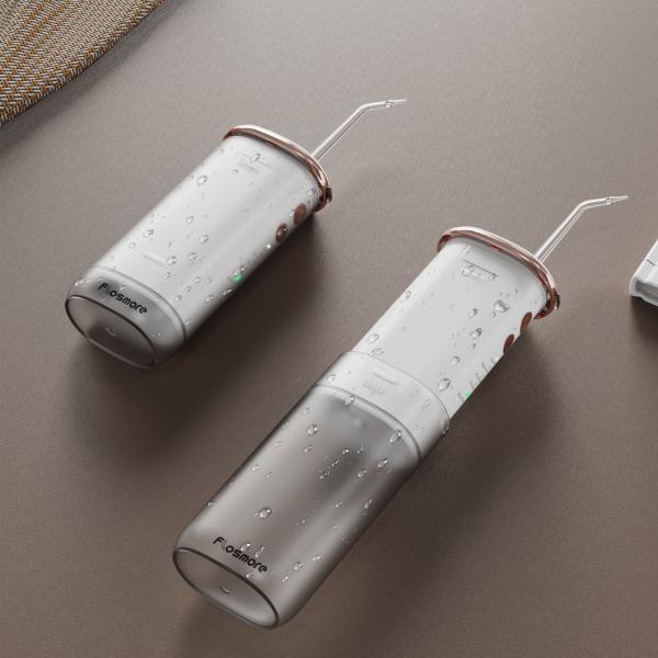 Fábrica dobrável de Flosser da água da bateria do jato de água 2000mAh do líquido de limpeza dos dentes do OEM