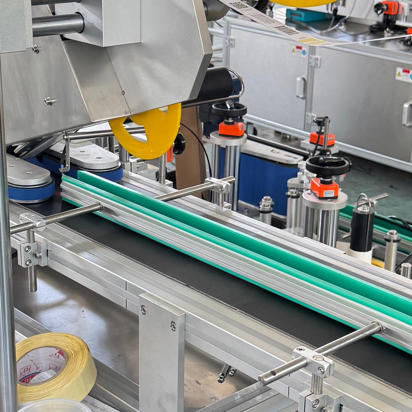 High Precision Automatic Garment Labeling Machine PLC Control With Stainless Steel Construction