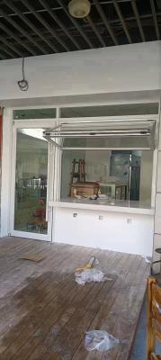 Aurora Mountain Cabin Folding Window Assembly Framing Snowy Peaks While Blocking Subzero Temperature Transfer