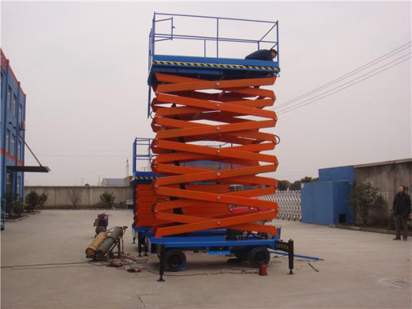 L'ascenseur hydraulique électrique mobile de ciseaux au-dessus de la taille protègent 300kg la capacité 16m