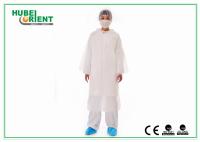 Vestidos de protecção descartáveis PE à prova de salpicos para uso de enfermeiros ou médicos