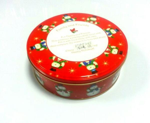 Recipiente do biscoito da lata do cilindro para o feriado do Natal com etiqueta na parte inferior