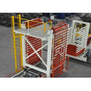 Sistema de carga y descarga totalmente automático de materiales para línea de